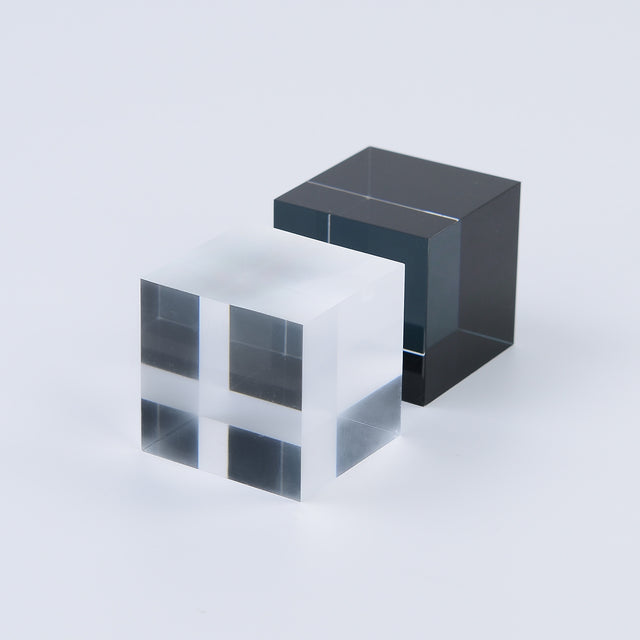 The Monochrome Pack cubes in translucent black, white and grey